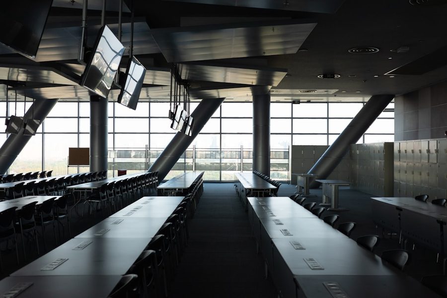 Conference hall prepared for a timed team-building table rotation