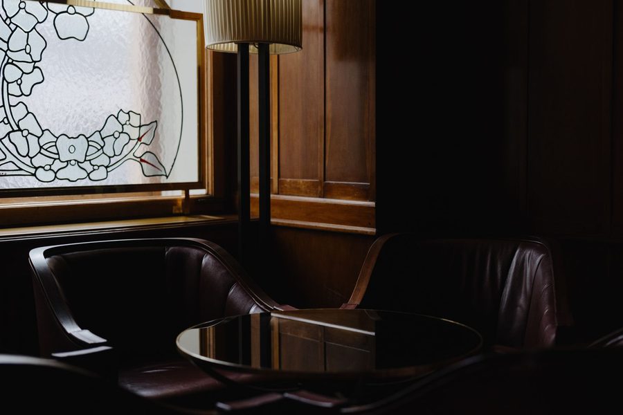 Classic leather lounge corner — the unhurried register of a VIP evening